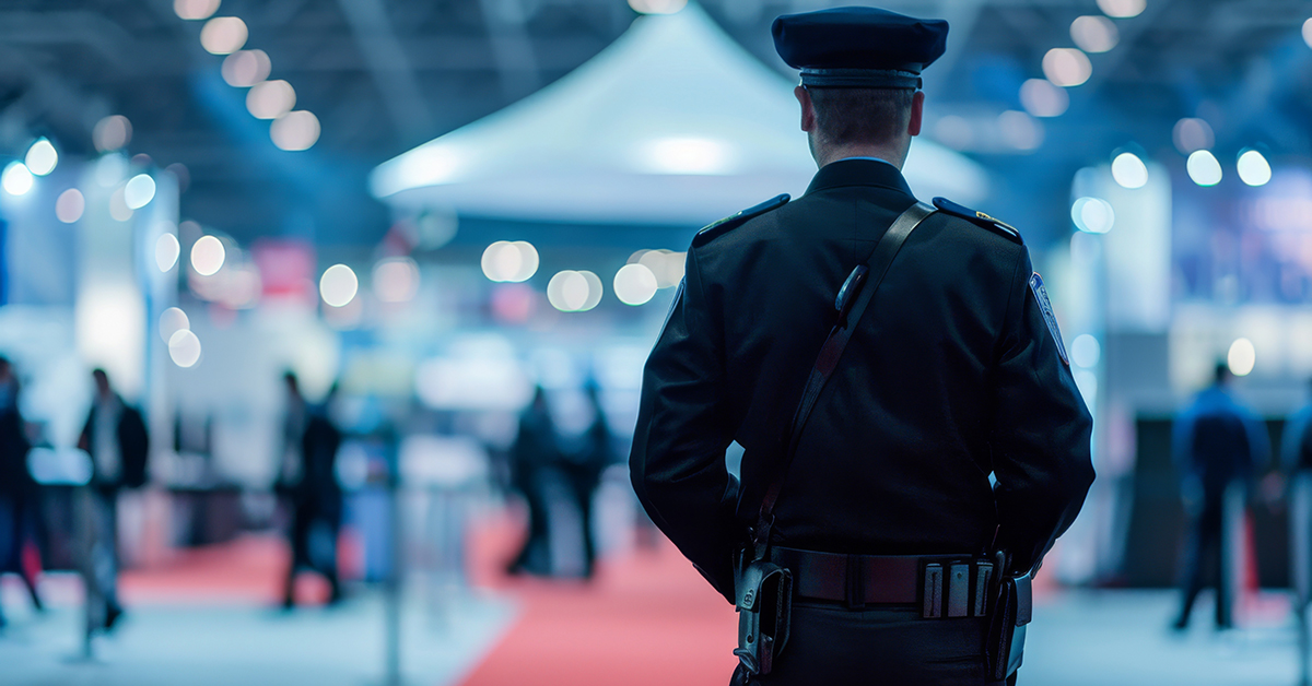 Guard Standing Backwards In The Background Trade Shows And Conventions